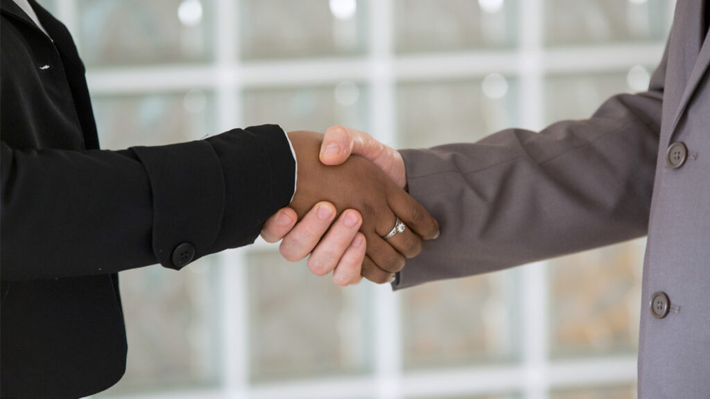 Handshake deal between two business people