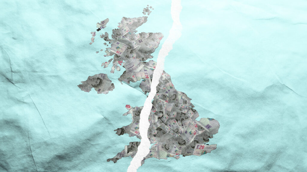 Map of the United Kingdom made of money and torn in half